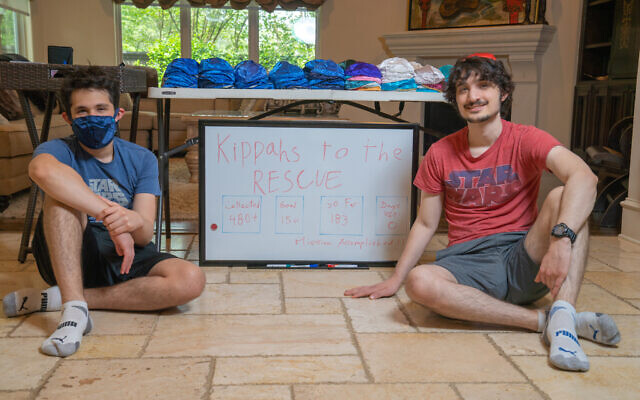 Matthew Jason (left) and Jeremy Jason at headquarters for their Kippas to the Rescue project, at home in Houston, April 2020. (Mark Jason) Matthew Jason (left) and Jeremy Jason at headquarters for their Kippas to the Rescue project, at home in Houston, April 2020. (Mark Jason)