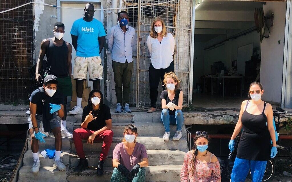 Leah Hecht and other volunteers assembling and delivering food packages in south Tel Aviv, April 3, 2020 (Courtesy ARDC) Leah Hecht and other volunteers assembling and delivering food packages in south Tel Aviv, April 3, 2020 (Courtesy ARDC)