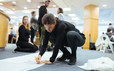 The Skinly team draws a garment prototype, January 8-9, 2020. (Courtesy)