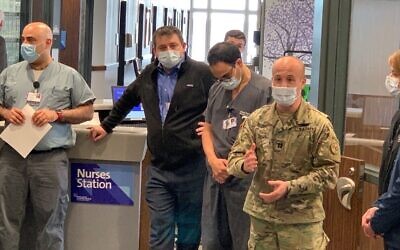 US Congressman Max Rose, in military fatigues, deployed with the National Guard to build convert an unused psychiatric facility into the nation’s first state-run, COVID-19-only emergency hospital, April 2020. (Courtesy of Rose)