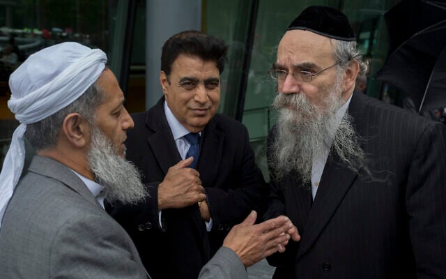 Rabbi Avrohom Pinter, right, speaks with other community leaders in London, June 5, 2017. (Richard Baker / In Pictures via Getty Images via JTA) Rabbi Avrohom Pinter, right, speaks with other community leaders in London, June 5, 2017. (Richard Baker / In Pictures via Getty Images via JTA)