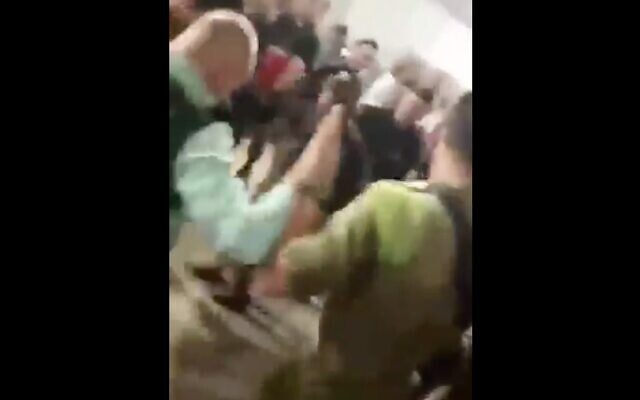 Screen capture from a video of IDF soldiers taking part in Mimouna celebrations at the Nahal Infantry Brigade's training base near Tel Arad, April 15, 2020, in violation of directives against the coronavirus. (Screen capture: Twitter) Screen capture from a video of IDF soldiers taking part in Mimouna celebrations at the Nahal Infantry Brigade's training base near Tel Arad, April 15, 2020, in violation of directives against the coronavirus. (Screen capture: Twitter)