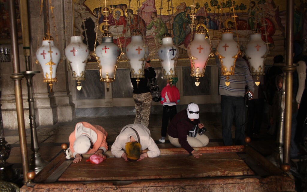 The Stone of the Anointing, or Unction, in the Church of the Holy Sepulchre in Jerusalem, where Christians believe Jesus was prepared for burial. (Shmuel Bar-Am)