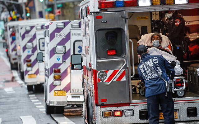 A patient arrives in an ambulance outside NYU Langone Medical Center in New York, April 13, 2020. (AP/John Minchillo) A patient arrives in an ambulance outside NYU Langone Medical Center in New York, April 13, 2020. (AP/John Minchillo)