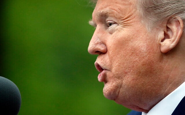 US President Donald Trump speaks about the coronavirus at the White House in Washington, April 14, 2020. (AP/Alex Brandon) US President Donald Trump speaks about the coronavirus at the White House in Washington, April 14, 2020. (AP/Alex Brandon)