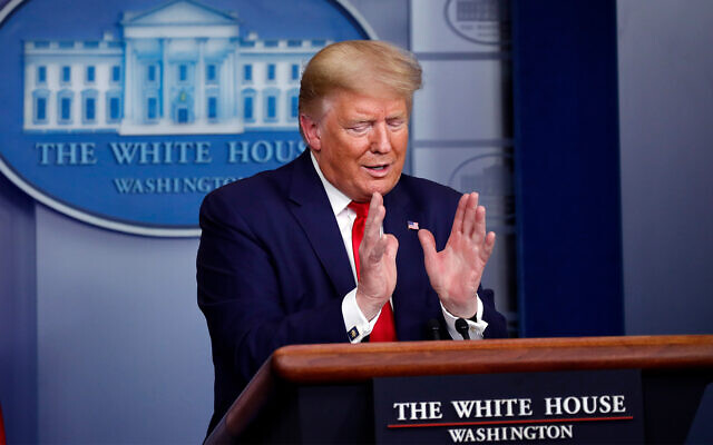 US President Donald Trump speaks about the coronavirus at the White House, April 3, 2020, in Washington. (AP/Alex Brandon) US President Donald Trump speaks about the coronavirus at the White House, April 3, 2020, in Washington. (AP/Alex Brandon)