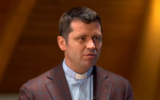 Romanian Catholic priest Francisc Dobos, the spokesperson for the Archdiocese of Bucharest, in 2019. (Screenshot: YouTube)