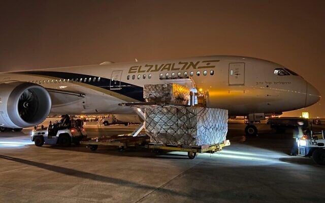 In this photo sent out by the Defense Ministry on April 5, 2020, an El Al plane in China is loaded with medical equipment to bring to Israel. (El Al) In this photo sent out by the Defense Ministry on April 5, 2020, an El Al plane in China is loaded with medical equipment to bring to Israel. (El Al)