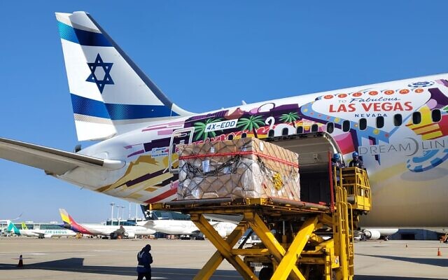 Crews load chemical reagents and protective suits onto an El Al plane in South Korea on April 8, 2020. (Defense Ministry) Crews load chemical reagents and protective suits onto an El Al plane in South Korea on April 8, 2020. (Defense Ministry)