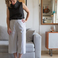 Clothing designer Anat Friedman modeling her 2020 spring collection, after the coronavirus shuttered her store and studio (Courtesy Adir Alharar)