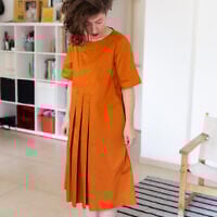 Clothing designer Anat Friedman modeling her 2020 spring collection, after the coronavirus shuttered her store and studio (Courtesy Adir Alharar)