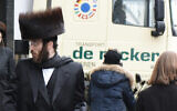 Illustrative: Ultra-Orthodox Jews walk in Antwerp, Belgium, March 16, 2016. (Cnaan Liphshiz)