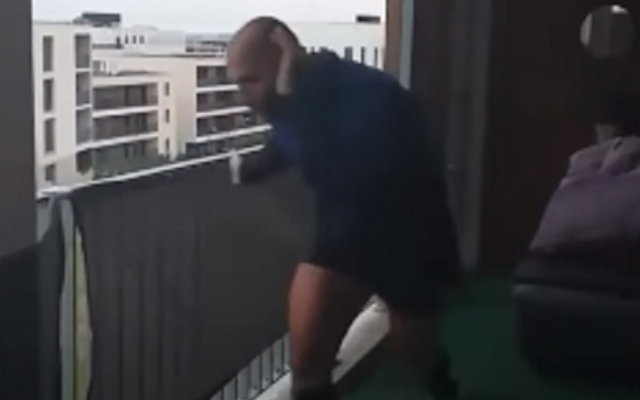 French-Jewish athlete Elisha Nochomovitz completing a marathon on his balcony during the coronavirus lockdown, March 2020 (YouTube screenshot) French-Jewish athlete Elisha Nochomovitz completing a marathon on his balcony during the coronavirus lockdown, March 2020 (YouTube screenshot)