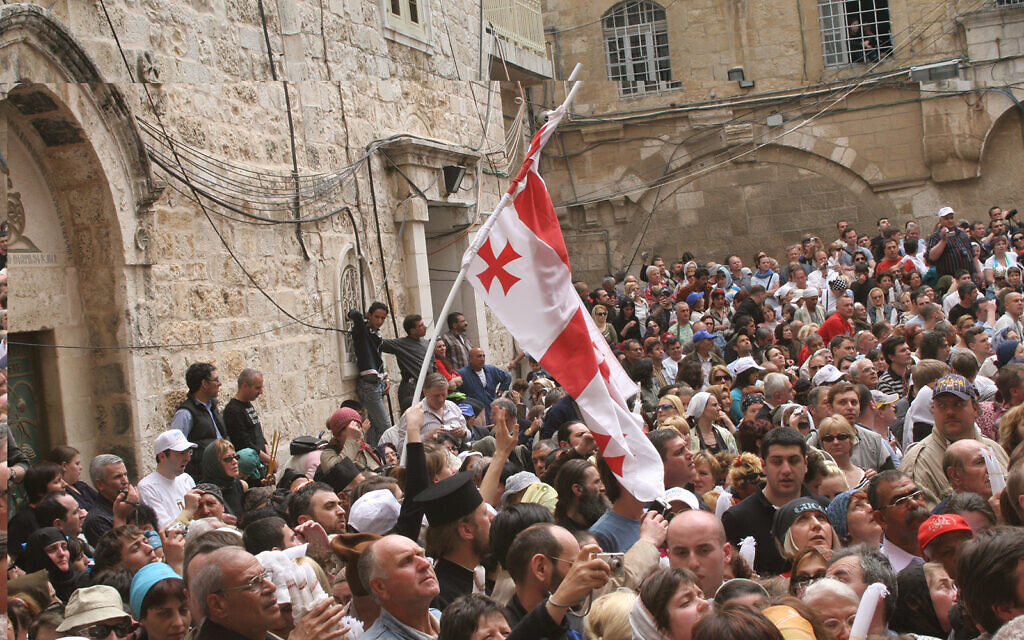 Crowds gather outside the Church of the Holy Sepulchre on Easter in Jerusalem. (Shmuel Bar-Am)