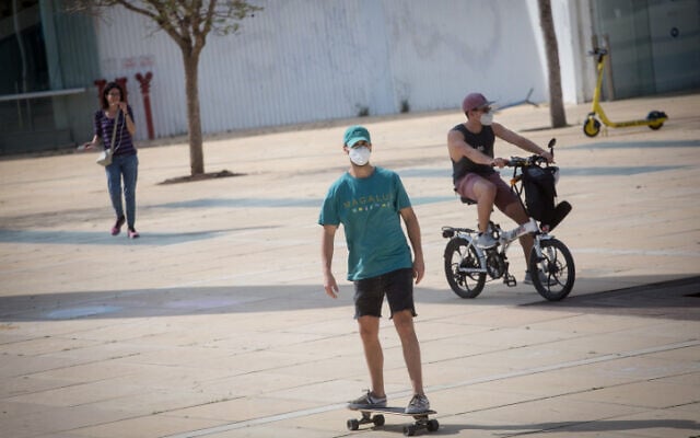 People in Tel Aviv on April 18, 2020. (Miriam Alster/FLASH90) People in Tel Aviv on April 18, 2020. (Miriam Alster/FLASH90)