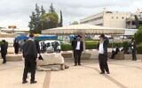 The funeral of Aliza Friedman, whose husband Tzvi Friedman is a leader of the so-called Jerusalem Faction, Petah Tikva, April 1, 2020 (Screen grab/Channel 12)