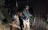 Soldiers inspect damage at the border fence between Israel and Lebanon, April 17, 2020 (Israel Defense Forces)