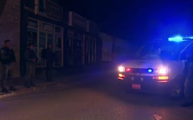 The scene after a shooting toward police cars in the southern town of Rahat, April 9, 2020 (Screen grab/Channel 13) The scene after a shooting toward police cars in the southern town of Rahat, April 9, 2020 (Screen grab/Channel 13)
