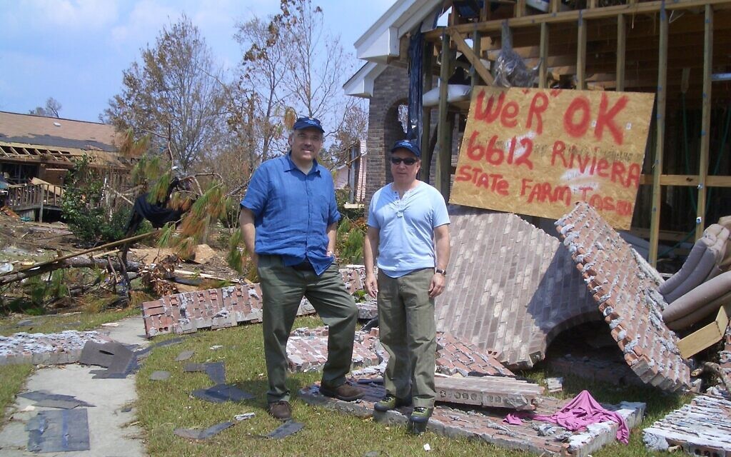 Irwin Redlener with Paul Simon in New Orleans after Hurricane Katrina, 2005. (Courtesy)