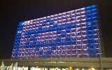 Tel Aviv's City Hall will be lit up for this year's Yom Ha'atzmaut celebration on April 28, 2020, which will eschew fireworks and parades for a more modest festivities in honor of Israel's 72nd year of independence. (courtesy, City of Tel Aviv-Jaffa)