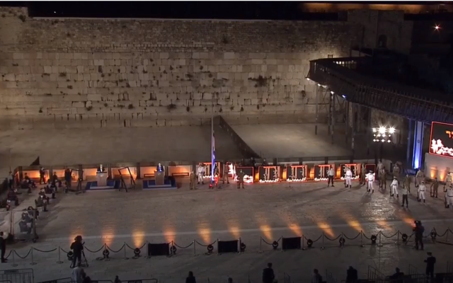 The national opening ceremony for Israel's Memorial Day for fallen soldeirs and victims of terror takes place at a nearly empty Western Wall plaza in Jerusalem amid the coronavirus pandemic, April 27, 2020 (video screenshot) The national opening ceremony for Israel's Memorial Day for fallen soldeirs and victims of terror takes place at a nearly empty Western Wall plaza in Jerusalem amid the coronavirus pandemic, April 27, 2020 (video screenshot)