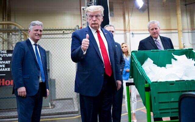 US President Donald Trump tours a Honeywell International Inc. factory producing N95 masks during his first trip since widespread COVID-19 related lockdowns went into effect May 5, 2020, in Phoenix, Arizona. (Brendan Smialowski / AFP) US President Donald Trump tours a Honeywell International Inc. factory producing N95 masks during his first trip since widespread COVID-19 related lockdowns went into effect May 5, 2020, in Phoenix, Arizona. (Brendan Smialowski / AFP)