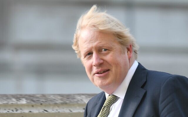 Britain's Prime Minister Boris Johnson takes a morning walk in central London on May 6, 2020. (DANIEL LEAL-OLIVAS / AFP) Britain's Prime Minister Boris Johnson takes a morning walk in central London on May 6, 2020. (DANIEL LEAL-OLIVAS / AFP)