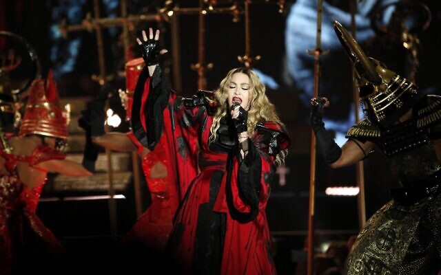 In this photograph taken on December 9, 2015, US singer Madonna performs during a concert at The AccorHotels Arena in Paris. (FRANCOIS GUILLOT / AFP)