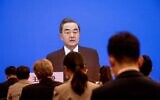China's Foreign Minister Wang Yi speaks during his online video link press conference during the National People's Congress (NPC) at the media center in Beijing on May 24, 2020. (NICOLAS ASFOURI / AFP)