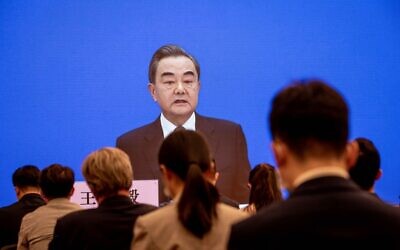 China's Foreign Minister Wang Yi speaks during his online video link press conference during the National People's Congress (NPC) at the media center in Beijing on May 24, 2020. (NICOLAS ASFOURI / AFP)