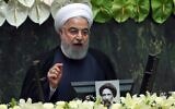 Iranian President Hassan Rouhani delivers a speech during the inaugural session of the new parliament in Tehran on May 27, 2020. (AFP)