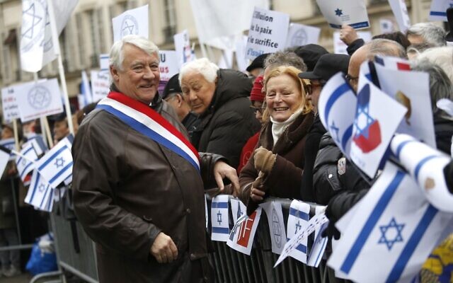 In this file photo taken on January 15, 2017, the Mayor of the 16th arrondissement Claude Goasguen greets protestors as they demonstrate during a rally in Paris against the Paris Middle East peace conference taking place in the French capital. (Photo by Pierre Constant/ AFP) In this file photo taken on January 15, 2017, the Mayor of the 16th arrondissement Claude Goasguen greets protestors as they demonstrate during a rally in Paris against the Paris Middle East peace conference taking place in the French capital. (Photo by Pierre Constant/ AFP)