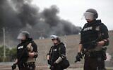 Police hold a line on the fourth day of protests on May 29, 2020 in Minneapolis, Minnesota. The National Guard has been activated as protests continue after the death of George Floyd which has caused widespread destruction and fires across Minneapolis and St. Paul.  (Scott Olson/Getty Images/AFP)