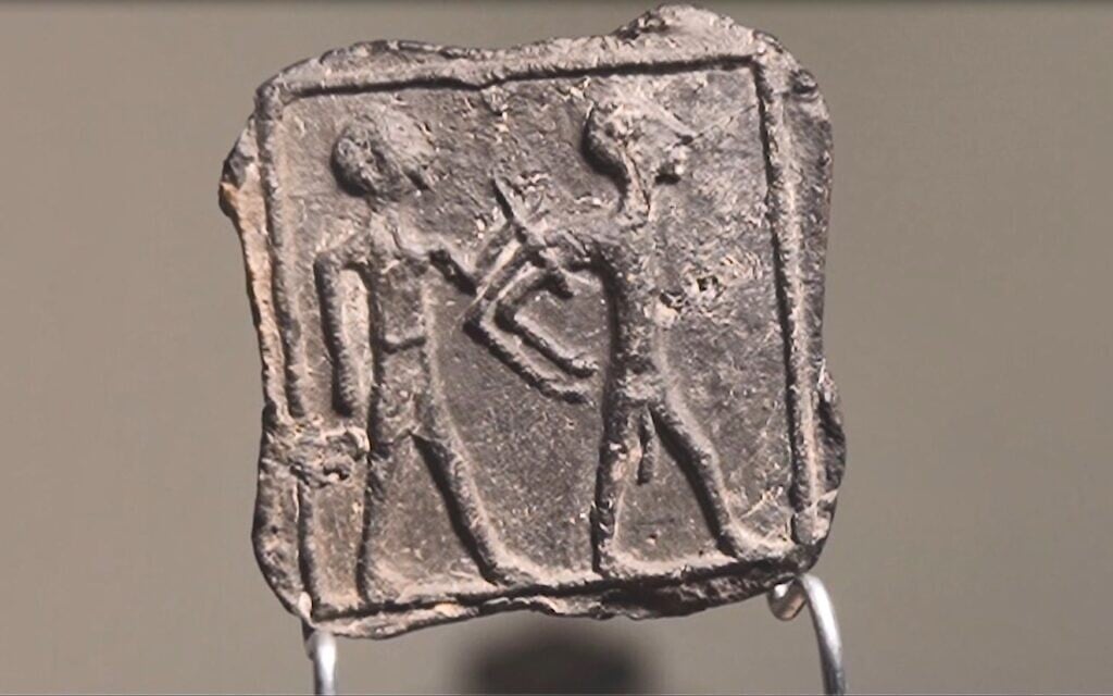 3,500-year-old Canaanite clay piece found on Tel Gama (the Canaanite city of Yarza) in March 2020. (Emil Eljam/Israel Antiquities Authority)