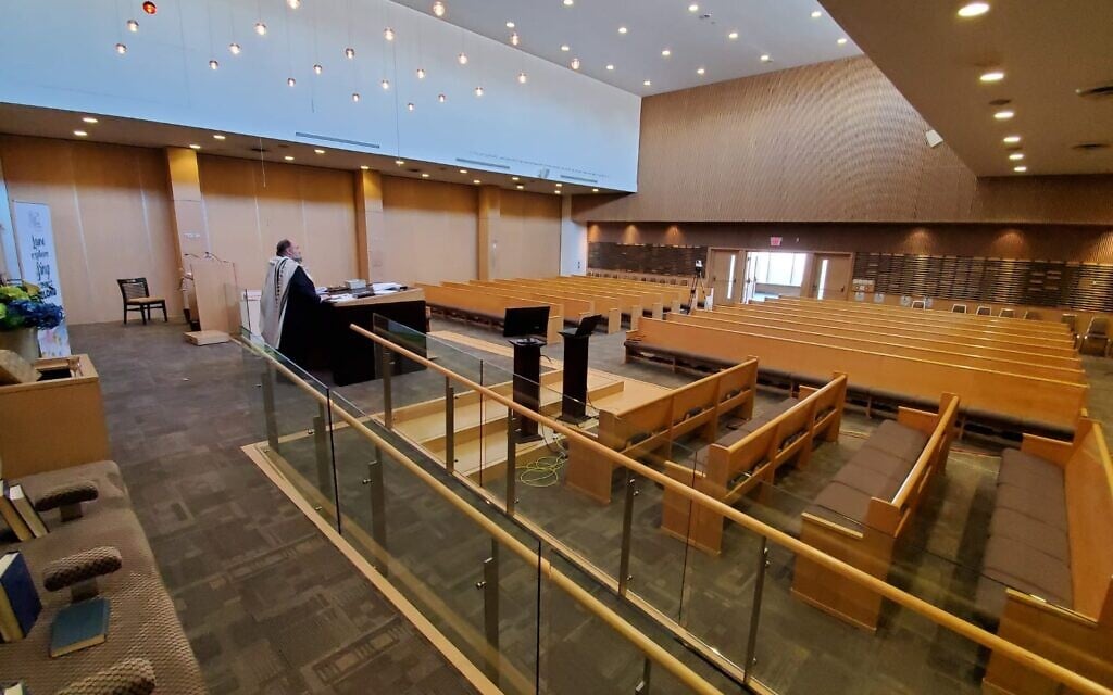 Illustrative: Rabbi Yossi Sapirman holds a prayer service on camera in the city's Beth Torah synagogue, without congregants. (Courtesy of Sapirman/ via JTA) Illustrative: Rabbi Yossi Sapirman holds a prayer service on camera in the city's Beth Torah synagogue, without congregants. (Courtesy of Sapirman/ via JTA)