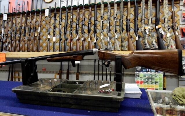 Rifles line a hunting store's shelves in Ottawa, May 16, 2006. (Jonathan Hayward/The Canadian Press via AP) Rifles line a hunting store's shelves in Ottawa, May 16, 2006. (Jonathan Hayward/The Canadian Press via AP)