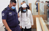 Amiram Ben Uliel in the Lod District Court on May 18, 2020. (Avshalom Sassoni/Pool Photo via AP)