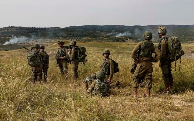 Illustrative: Israeli troops take part in a drill in northern Israel, May 13, 2020. (Tsafrir Abayov/AP)