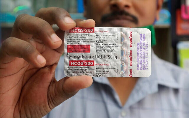 In this on May 19, 2020 file photo, a chemist holds a pack of hydroxychloroquine tablets in Mumbai, India. (AP/Rafiq Maqbool) In this on May 19, 2020 file photo, a chemist holds a pack of hydroxychloroquine tablets in Mumbai, India. (AP/Rafiq Maqbool)
