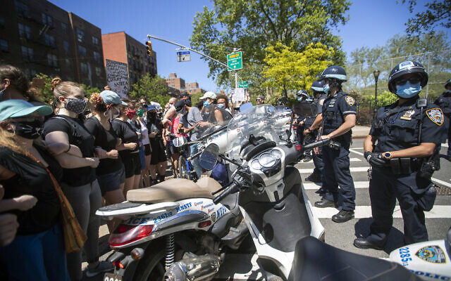 Protesters confront police blocking there access to the FDR Drive during a solidarity rally for George Floyd, Saturday, May 30, 2020, in New York (AP Photo/Mary Altaffer) Protesters confront police blocking there access to the FDR Drive during a solidarity rally for George Floyd, Saturday, May 30, 2020, in New York (AP Photo/Mary Altaffer)