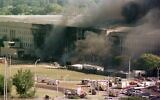 In this Sept. 11, 2001 file photo, the south side of the Pentagon burns (AP Photo/Tom Horan, File)