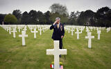 World War II and D-Day veteran Charles Norman Shay, from Indian Island, Maine, salutes the grave of fellow soldier Edward Morozewicz at the Normandy American Cemetery in Colleville-sur-Mer, Normandy, France, May 1, 2019.  (AP Photo/Virginia Mayo)