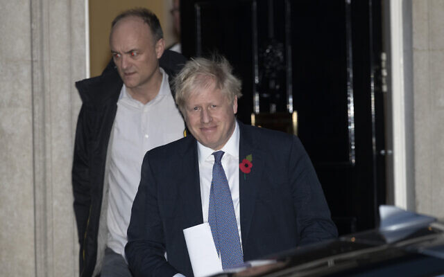 File: Then-British prime minister Boris Johnson and his adviser Dominic Cummings, left, leave 10 Downing Street in London, and get in a car together to go to the Houses of Parliament, Oct. 28, 2019 (AP Photo/Matt Dunham) File: Then-British prime minister Boris Johnson and his adviser Dominic Cummings, left, leave 10 Downing Street in London, and get in a car together to go to the Houses of Parliament, Oct. 28, 2019 (AP Photo/Matt Dunham)