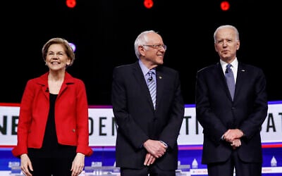 In this Feb. 25, 2020, file photo from left, Democratic presidential candidates, Sen. Elizabeth Warren, Sen. Bernie Sanders, former Vice President Joe Biden participate in a Democratic presidential primary debate in Charleston, South Carolina (AP Photo/Matt Rourke, File)