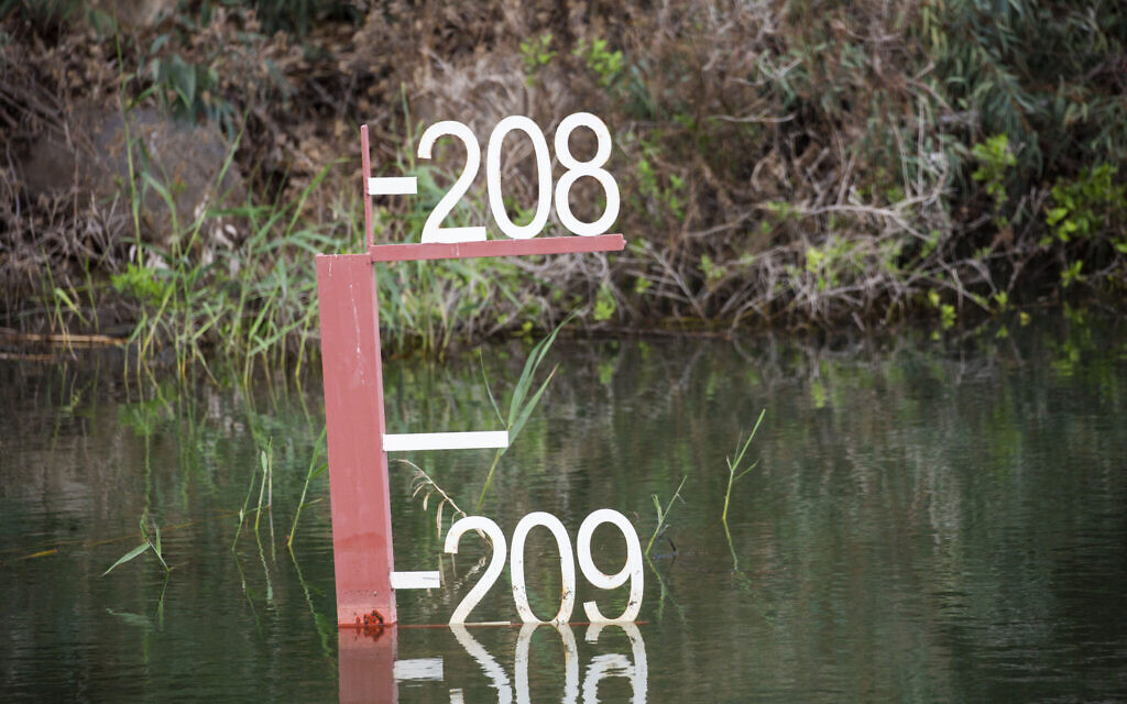 This April 25, 2020 photo shows the sea water level meter in the Sea of Galilee, locally known as Lake Kinneret (AP Photo/Ariel Schalit)