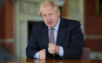 Britain's Prime Minister Boris Johnson delivers an address on lifting the country's lockdown amid the coronavirus pandemic, May 10, 2020. (Andrew Parsons/10 Downing Street via AP)