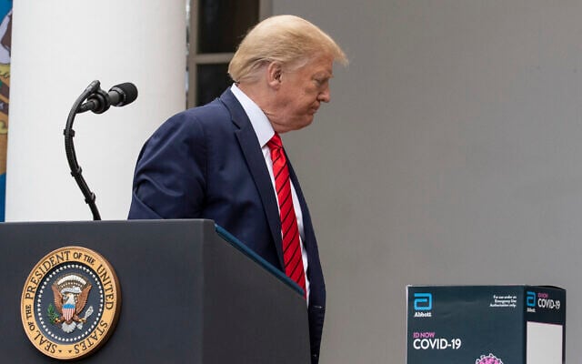 US President Donald Trump departs after speaking about the coronavirus during a press briefing in the Rose Garden of the White House on May 11, 2020, in Washington. (AP Photo/Alex Brandon) US President Donald Trump departs after speaking about the coronavirus during a press briefing in the Rose Garden of the White House on May 11, 2020, in Washington. (AP Photo/Alex Brandon)