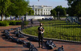 Margot Bloch, of Takoma Park, Md., participates in a protest over President Trump's handling go the coronavirus pandemic, in Lafayette Park across the street from the White House in Washington, Wednesday, May 20, 2020.(AP/Evan Vucci)