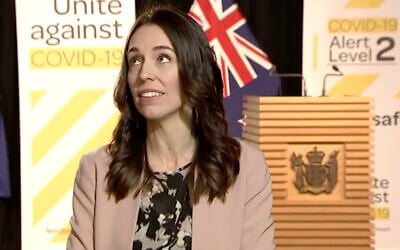 In this image made from video, New Zealand Prime Minister Jacinda Ardern looks up when an earthquake struck during a live television interview in Wellington, New Zealand, May 25, 2020 (Newshub via AP)