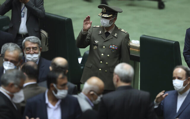 Commander of the Iranian Army Gen. Abdolrahim Mousavi wears a protective face mask to help prevent the spread of the coronavirus waves as he arrives for the inauguration of the new parliament, in Tehran, Iran, May, 27, 2020. (Vahid Salemi/AP) Commander of the Iranian Army Gen. Abdolrahim Mousavi wears a protective face mask to help prevent the spread of the coronavirus waves as he arrives for the inauguration of the new parliament, in Tehran, Iran, May, 27, 2020. (Vahid Salemi/AP)